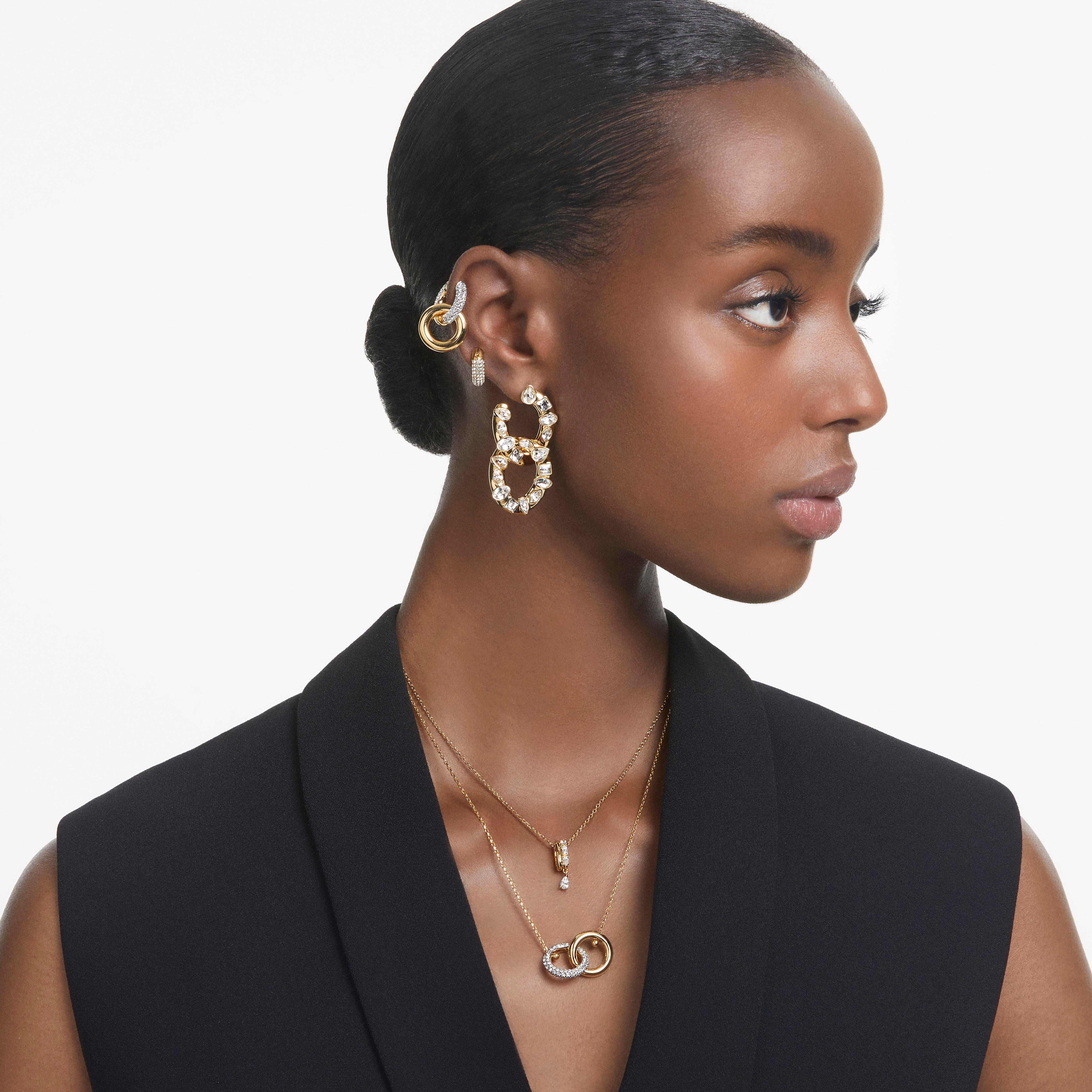 swarovski dextera hoop earrings  interlocking loop  white  gold tone plated