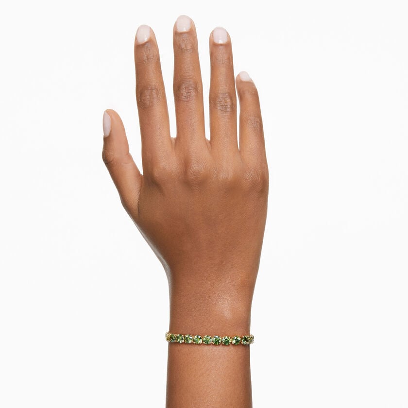 swarovski matrix tennis bracelet  round cut  green  gold tone plated