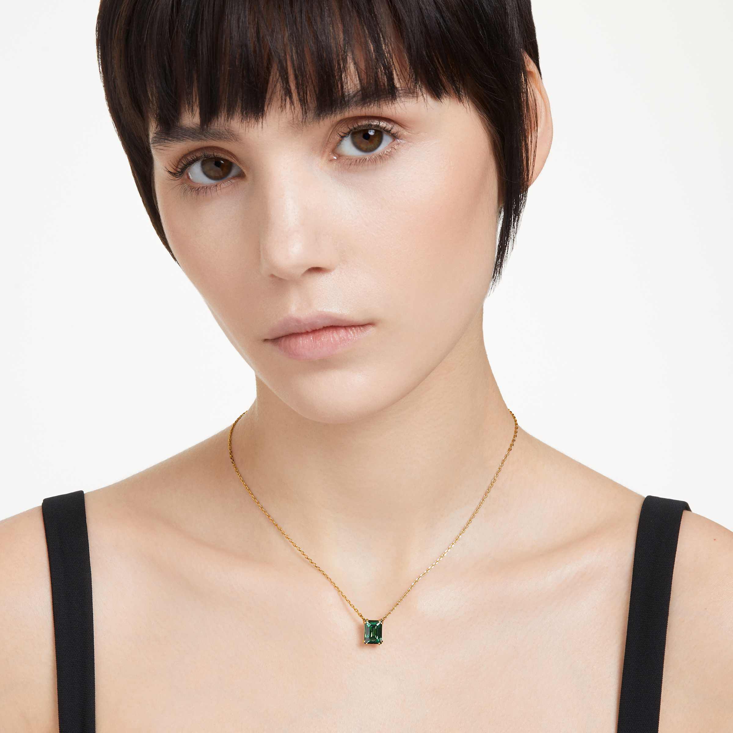 swarovski stilla pendant  rectangular cut  green  gold tone plated