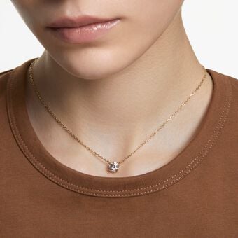 swarovski stilla pendant  round cut  white  18k gold finish