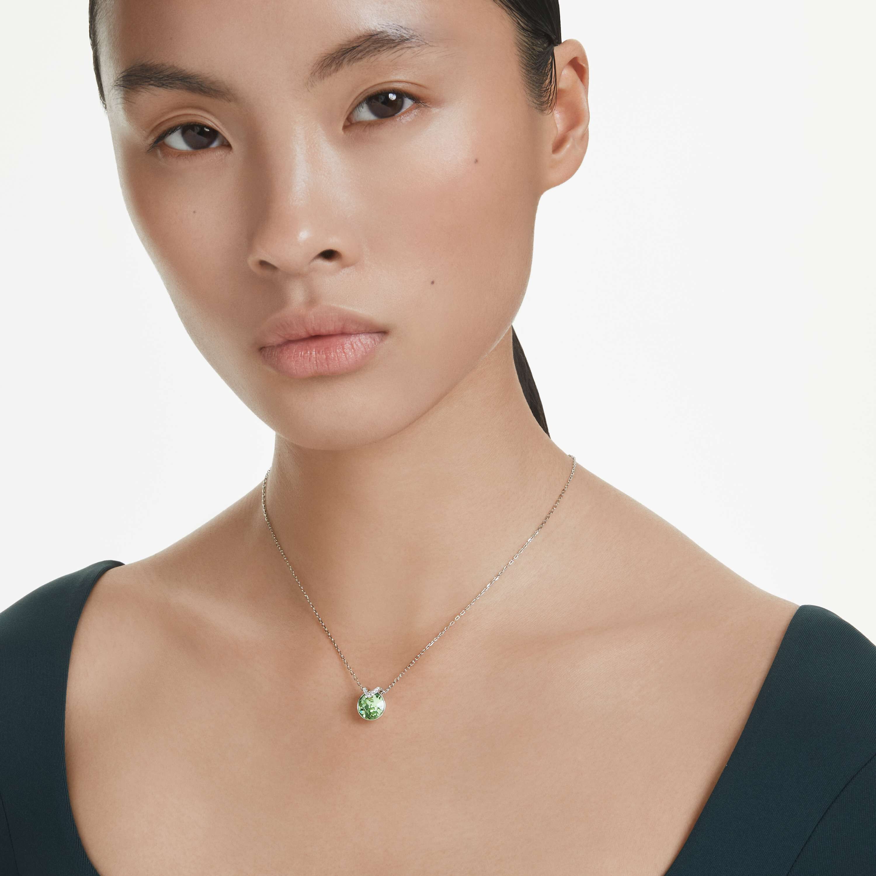 swarovski bella v pendant  round cut  green  rhodium plated