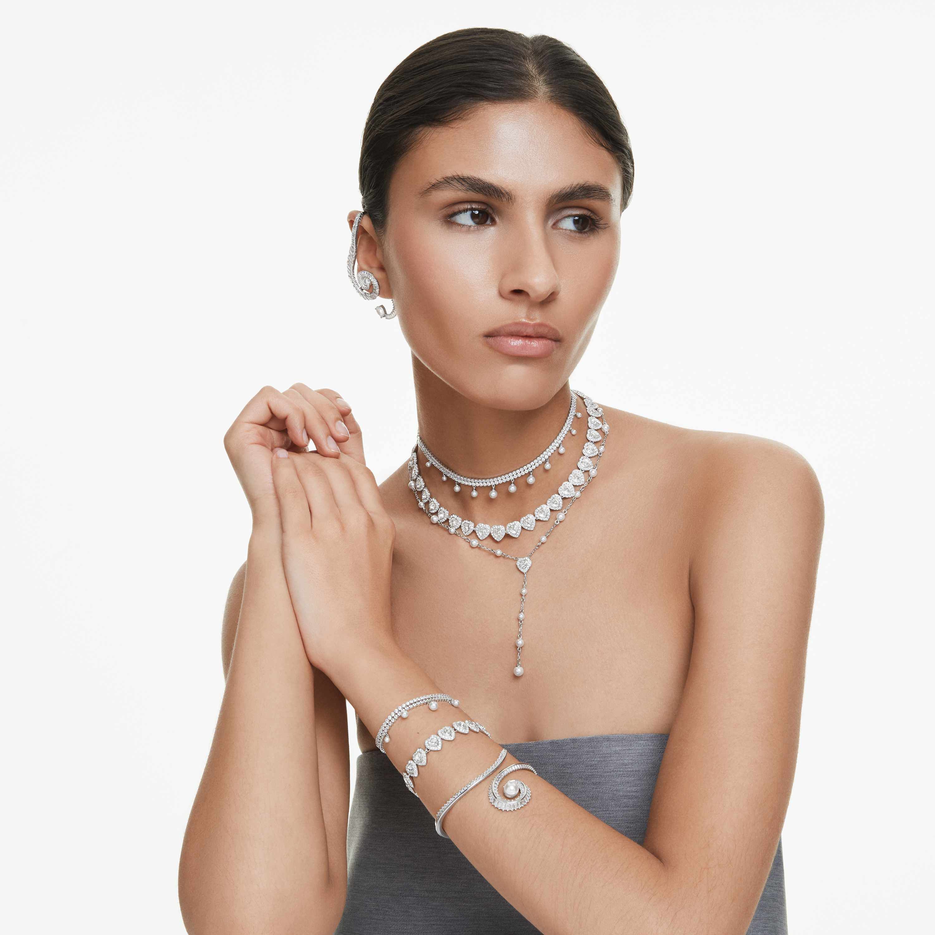 ariana grande x swarovski clip earrings  asymmetrical design  crystal pearl  baguette cut  white  rhodium plated